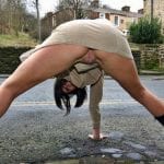 Hotwife’s tits pop out at festival, man’s hand on her waist