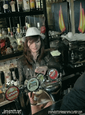 Bottomless barmaid Jeny Smith serving beer