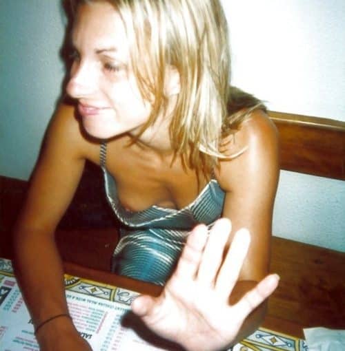 flashing tit at a restaurant table